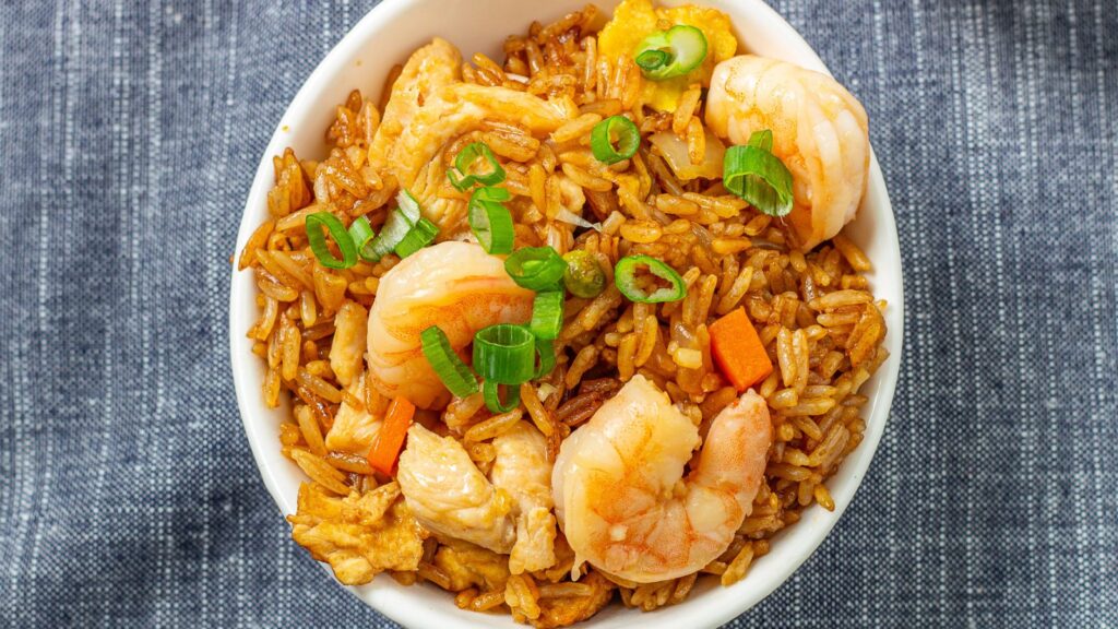 Shrimp fried in a bowl with rice